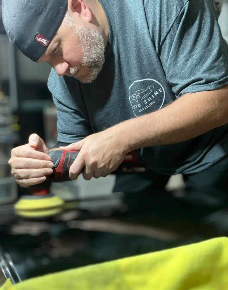 guy polishing a vehicle to remove scratches